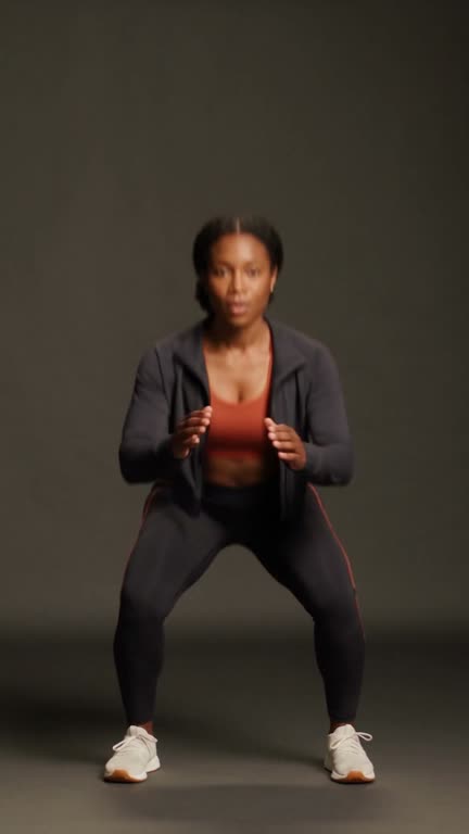 Melt session screen: Maya mid squat jump with the round timer and the cue Full squat, explode up, land quiet